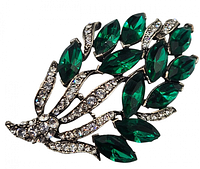 Front view showing green marquise stones and clear rhinestones