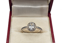 Close-up of Pandora sterling halo ring in box