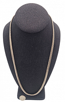 Necklace displayed on stand full length