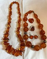 Overview of all five Baltic amber jewellery pieces