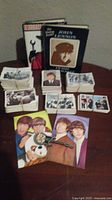 Overall lot with books, trading cards, postcards and magnifier