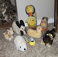 Group shot showing all eight Steiff animals