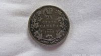 Reverse of 1902 Canadian 25 cents coin showing denomination and date