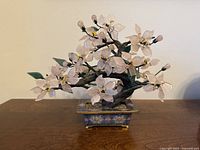 Full view of jade flowering tree in cloisonné planter