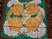 Full view of Hermès Legend Brodee silk scarf laid flat showing entire pattern