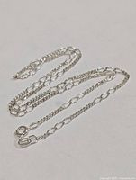 Full view of silver chain laid out