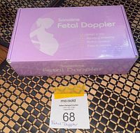 Purple retail box labeled Sonoline Fetal Doppler