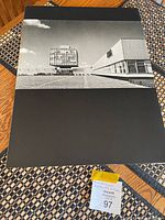 Front plate showing modernist building photograph