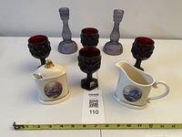 All items overview: sugar bowl, spoon, creamer, 4 chalices, 2 candlesticks