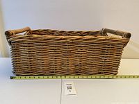 Side view showing full length with tape measure