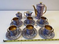 Full 15-piece set laid out with measuring tape