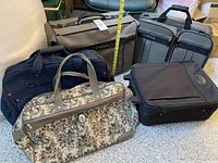 All five travel bags grouped together