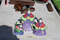 Full view of three-piece old-lady ceramic set