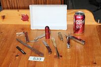 Overall lot layout on table with all tools and Hoppe drill bit container