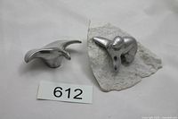 Both Hoselton sculptures together with lot tag