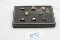 All eight rings displayed in tray