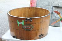 Full exterior view of wooden 1900 Gravity Washer tub