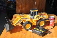 Full view of New Bright loader with controller and scale reference