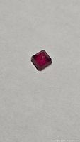 Ruby on white background showing overall shape and colour