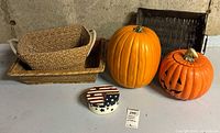 overall lot showing pumpkins, baskets, ceramic plate