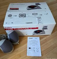 Retail box, pair of speakers, manual