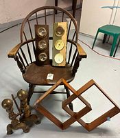 Lot overview showing chair, weather stations, shelf and andirons