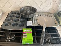 All five pieces laid out on stovetop