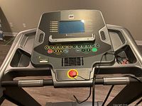 Console of BH Fitness treadmill showing controls and safety key