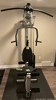 Front view of Body-Solid Powerline P1 home gym assembled on mats