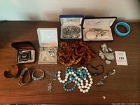 Full layout of costume jewelry on table