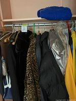 Front view of all six jackets and coats on hangers