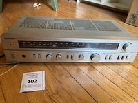 Full front view of Technics SA-104 receiver showing all controls