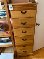 Full front view showing six drawers and hardware