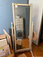 Full view of vintage swivel cheval mirror on stand