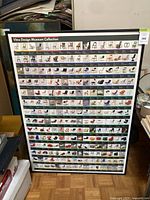 Front view of entire framed poster showing chair images and size