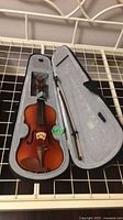 Violin, bow and case overview