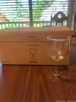 Closed carton showing World Market Madison Stemware labeling