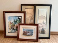 Group shot of all four framed prints standing