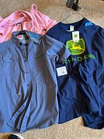 Pink bathrobe, Levi’s short-sleeve shirt, John Deere T-shirt