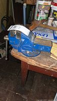 Full view of Woden No. 1 blue bench vise on bench