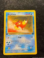 Front of Magikarp first edition Team Rocket card showing artwork, stats and set details