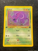 Front of 1st Edition Zubat Team Rocket card showing artwork, stats, set and edition info