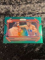 Front of Panini Prizm UFC 2023 green parallel card showing Khabib Nurmagomedov action image