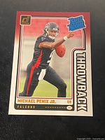 Front of 2024 Panini Donruss Rated Rookie Throwback Michael Penix Jr. card