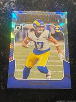 Front of 2024 Donruss Dominators Puka Nacua holographic card