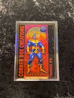 Front of Thanos Corner Box Creations card in sleeve