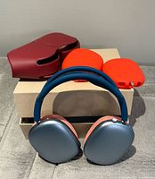 Front view of Apple AirPods Max with case and silicone covers