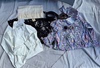 Group shot of all clothing pieces and accessories laid out