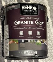 Front of unopened BEHR Granite Grip can showing product name, usage icons and size