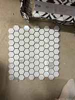 Sheet of white hexagon porcelain mosaic tile